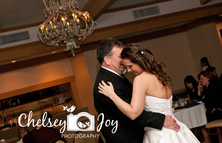 Bride dances with her father at her winter wedding. 