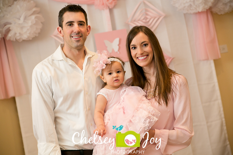 Baby J and her parents at the birthday party.