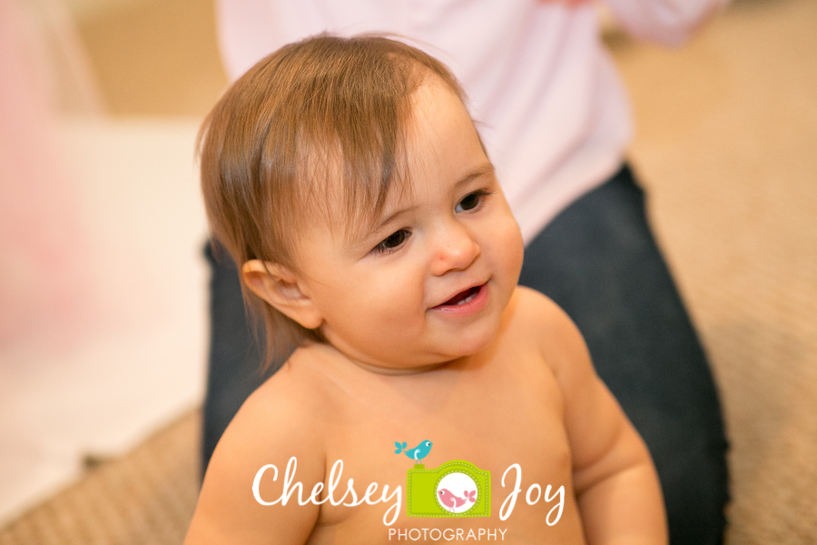 Baby J gets ready to eat cake.