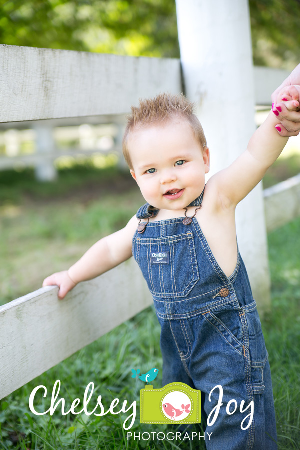 Jackson smiles for a Wheaton baby photographer. 