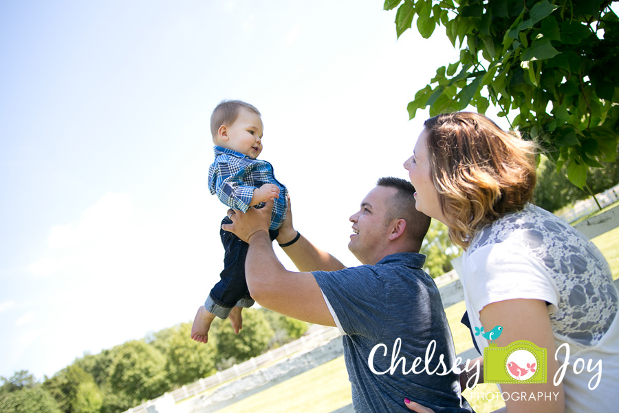 A family interacts with each other at the Danda Equestrian Center. 