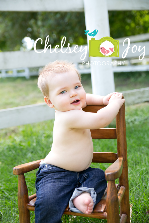 Jackson smiles during his 1 year photo session in Wheaton. 