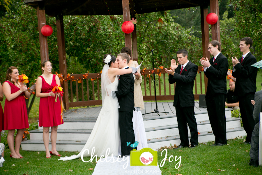 Bride and groom kissing at Hopkins Park wedding in DeKalb.