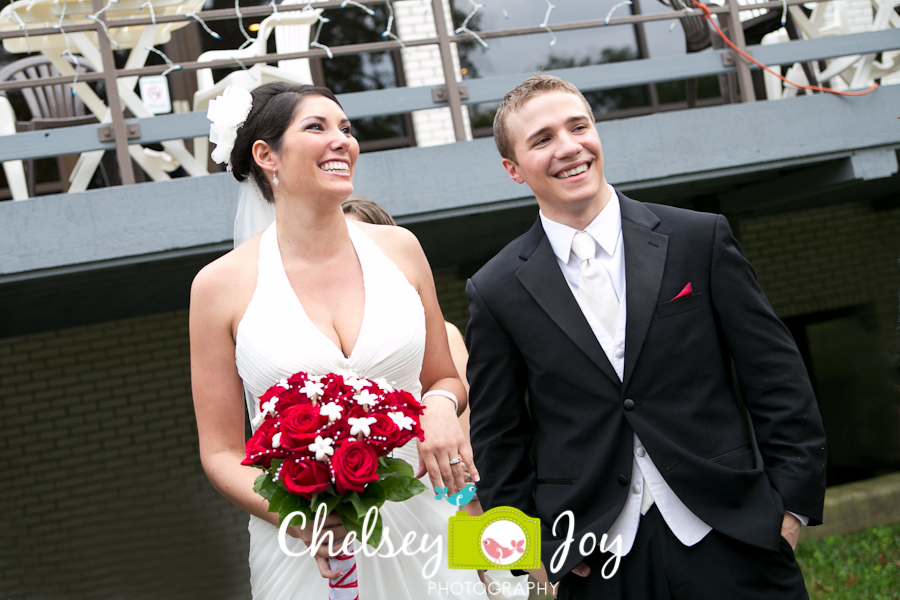 Bride and groom greeting guests at Hopkins Park. 