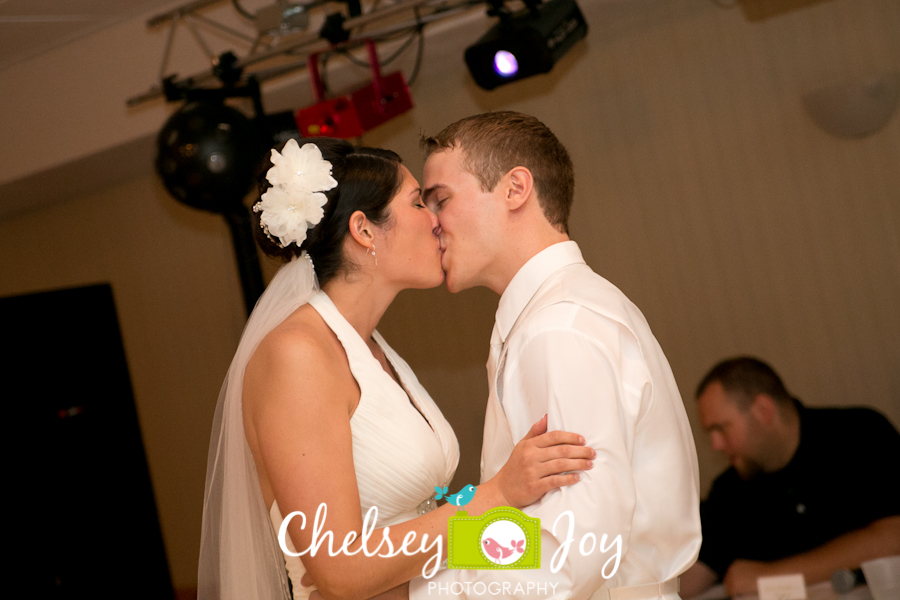 Bride and groom dancing at reception in the Hopkins Park Terrace Room. 