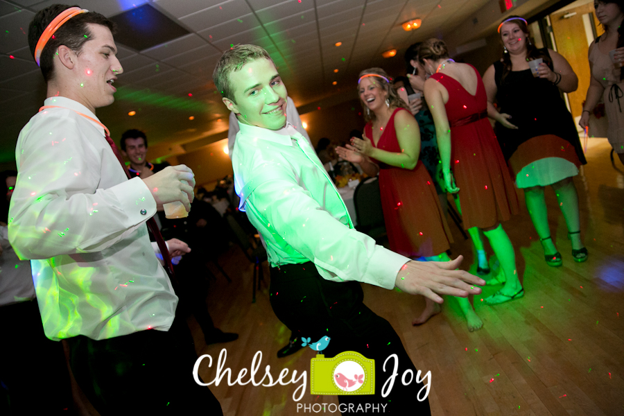 Groom dancing at Hopkins Park wedding reception. 