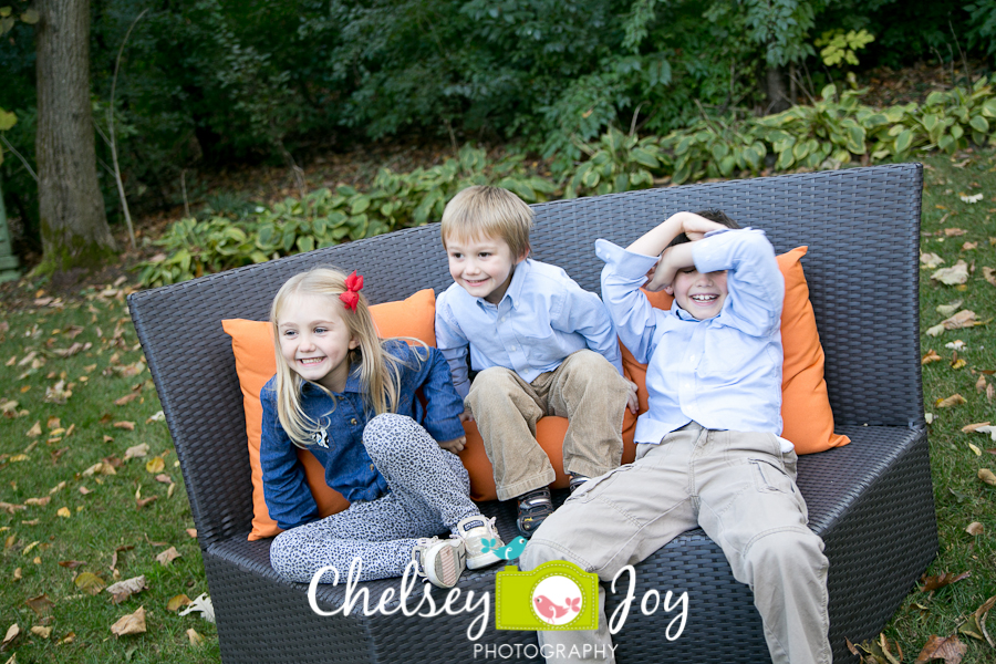 The children laugh during a portrait session. 