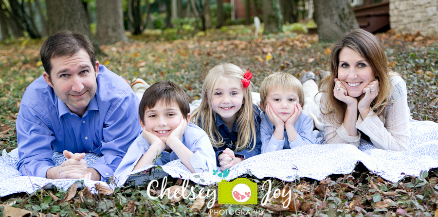 The B Family smiles during a photo session at their home. 