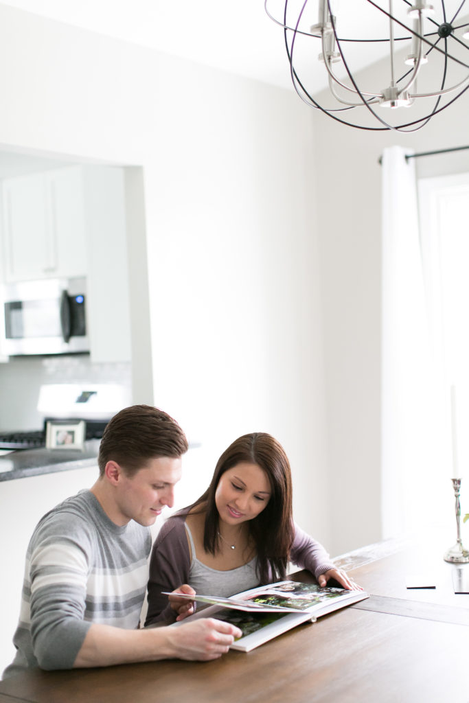 Couple looking at wedding album