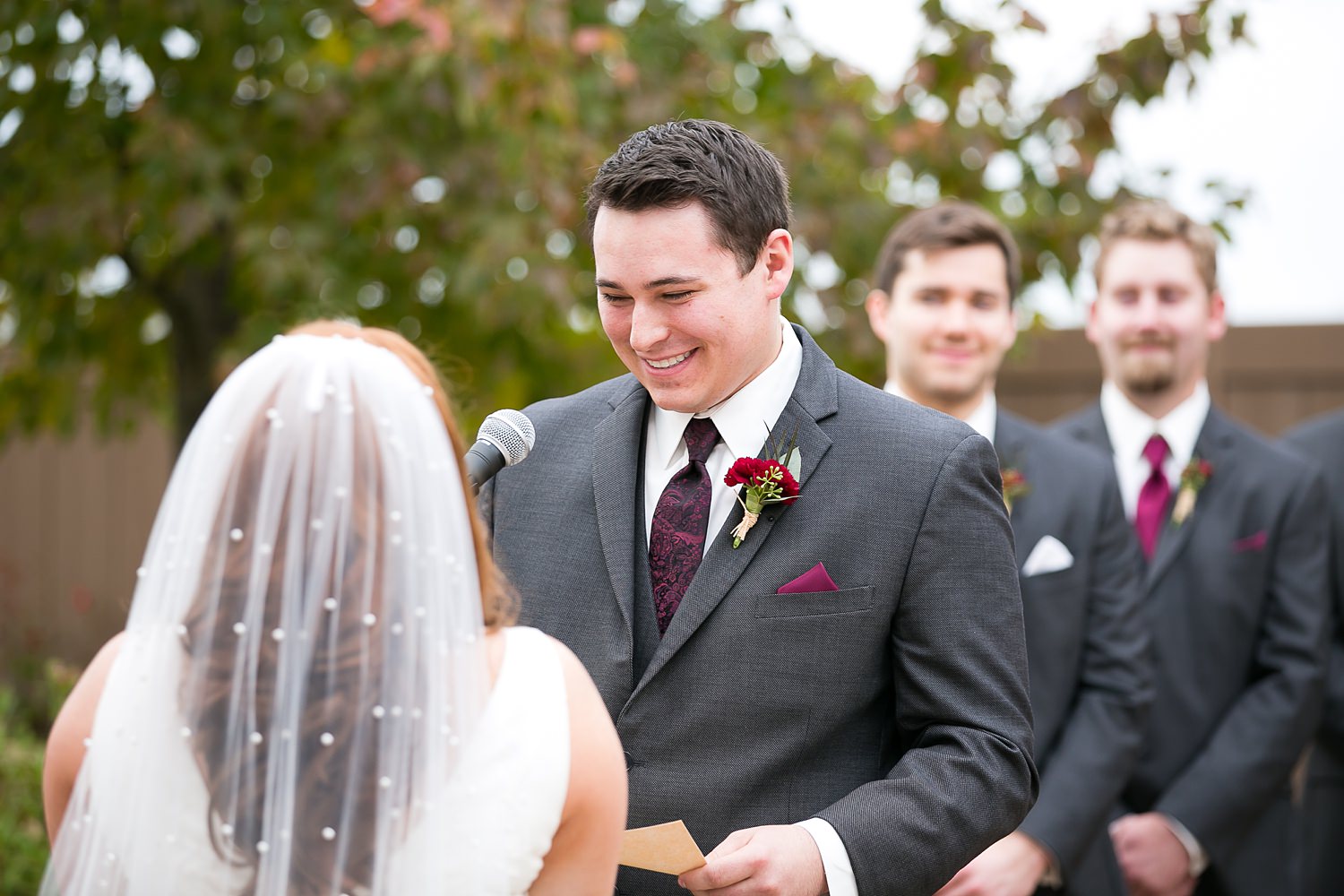 Groom reciting vows at Hoosier Grove Barn wedding