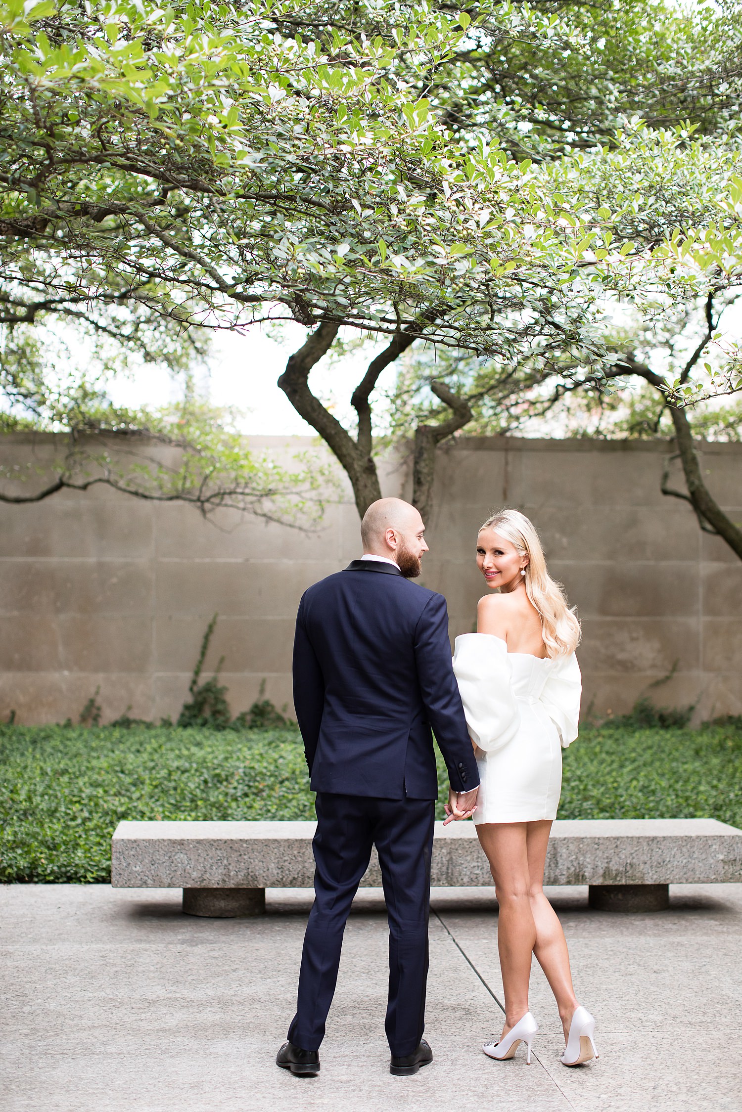 Marta and Nick walking in the Art Institute of Chicago garden