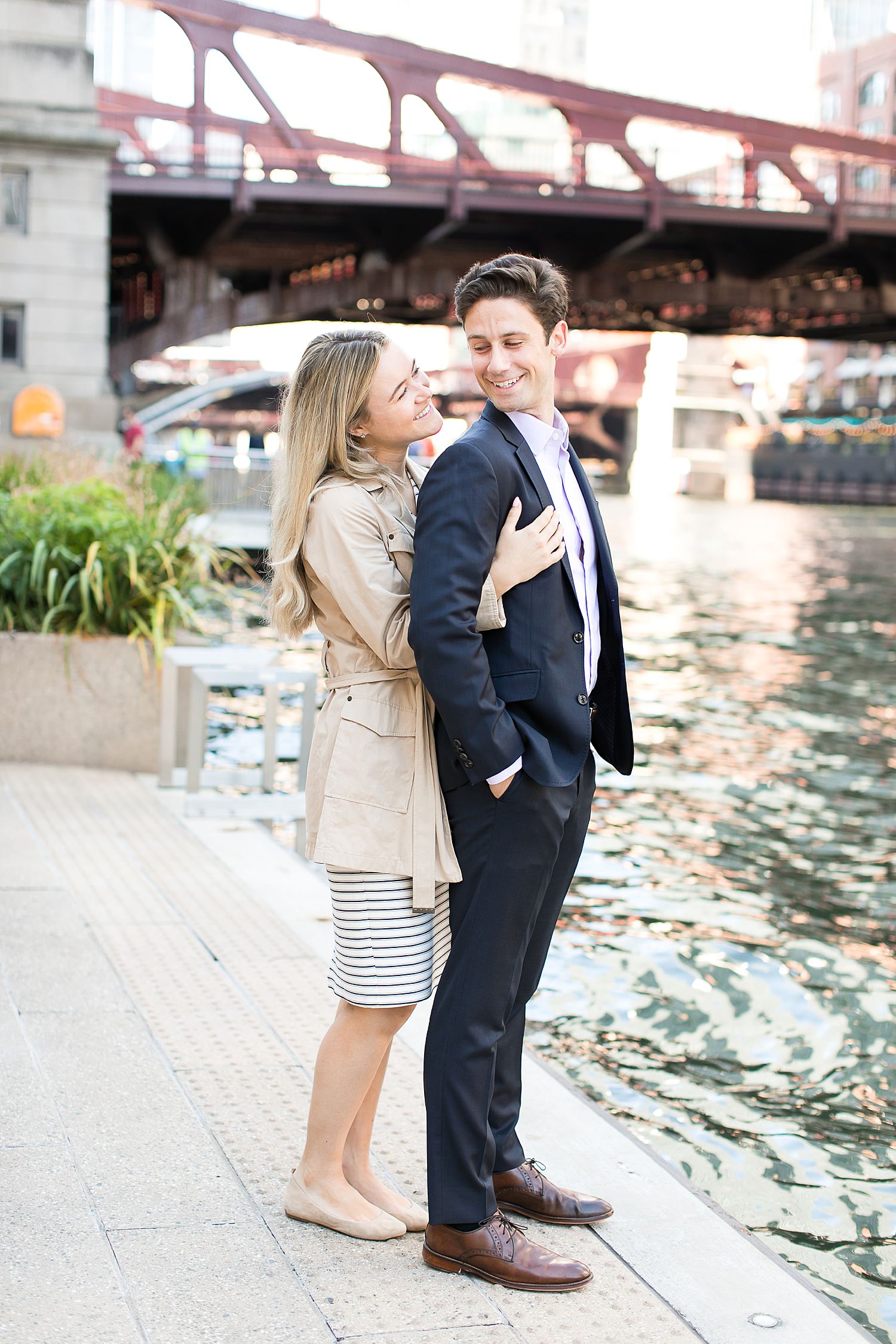 Evan and Julia take engagement photos by the Chicago Riverwalk.