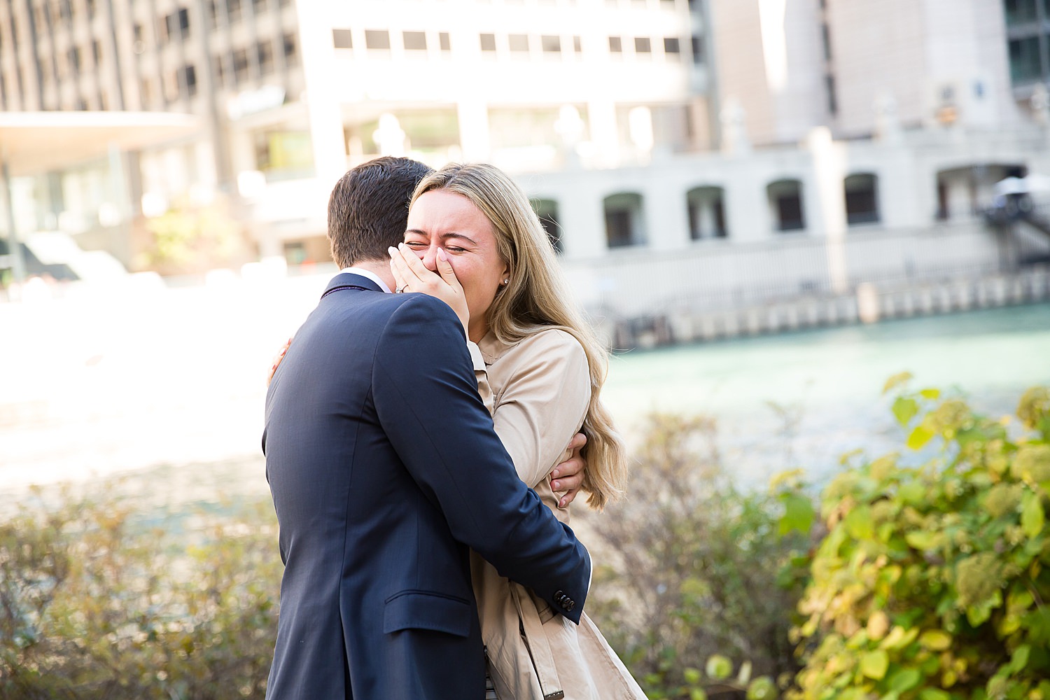 Julia cries after Evan's Chicago Riverwalk proposal.