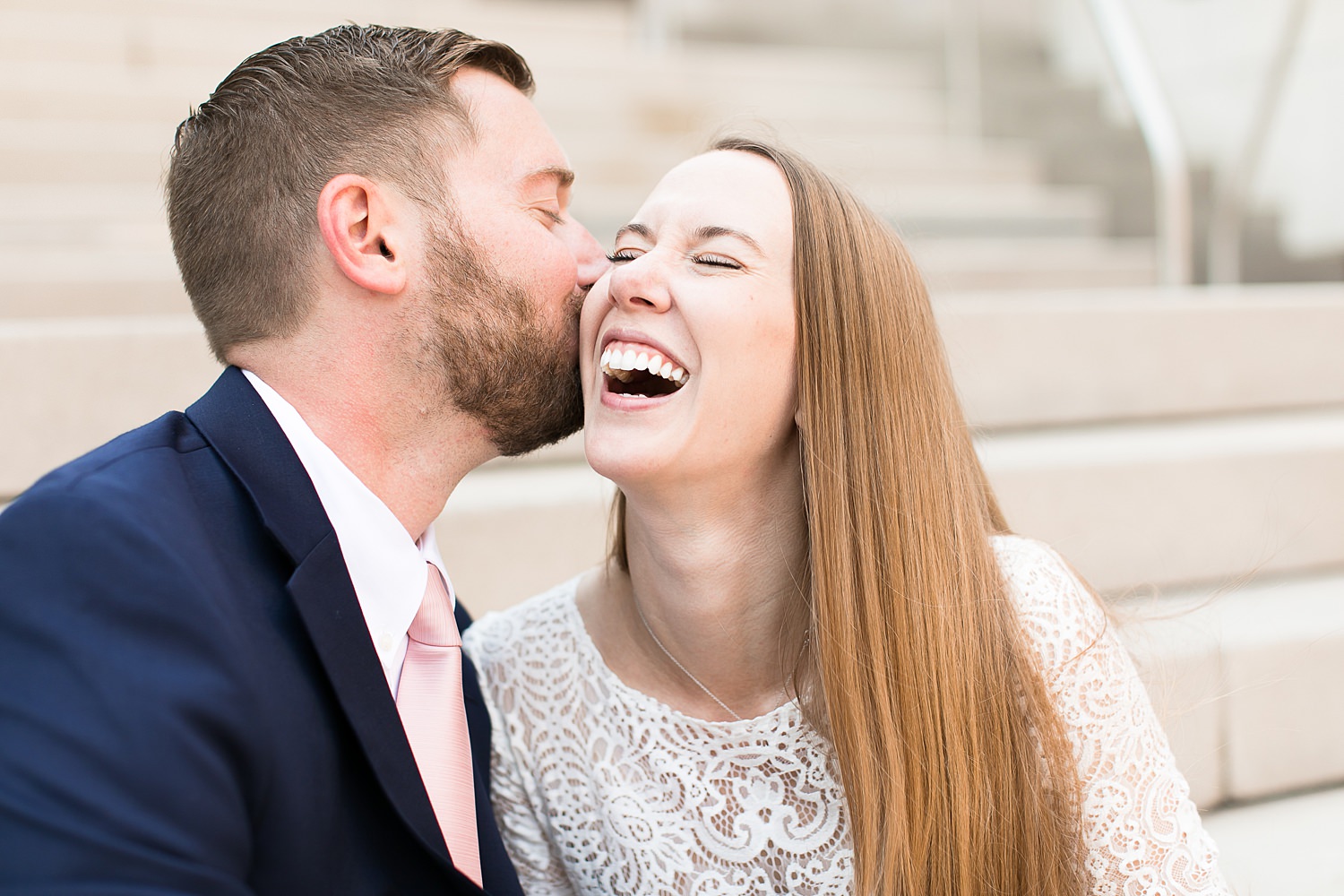 Couple laughs after their Chicago elopement.