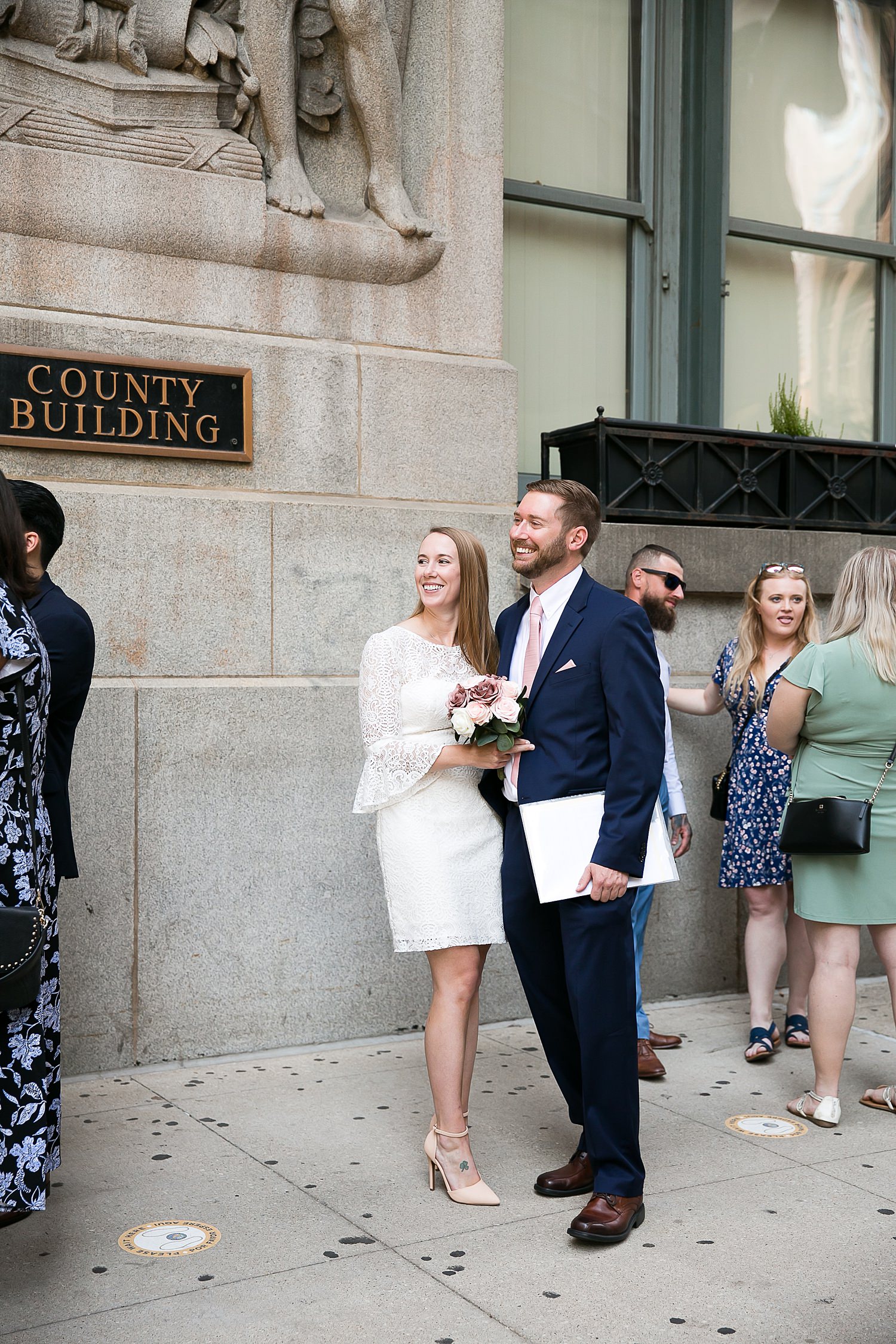 Couple waits outside Chicago City Hall