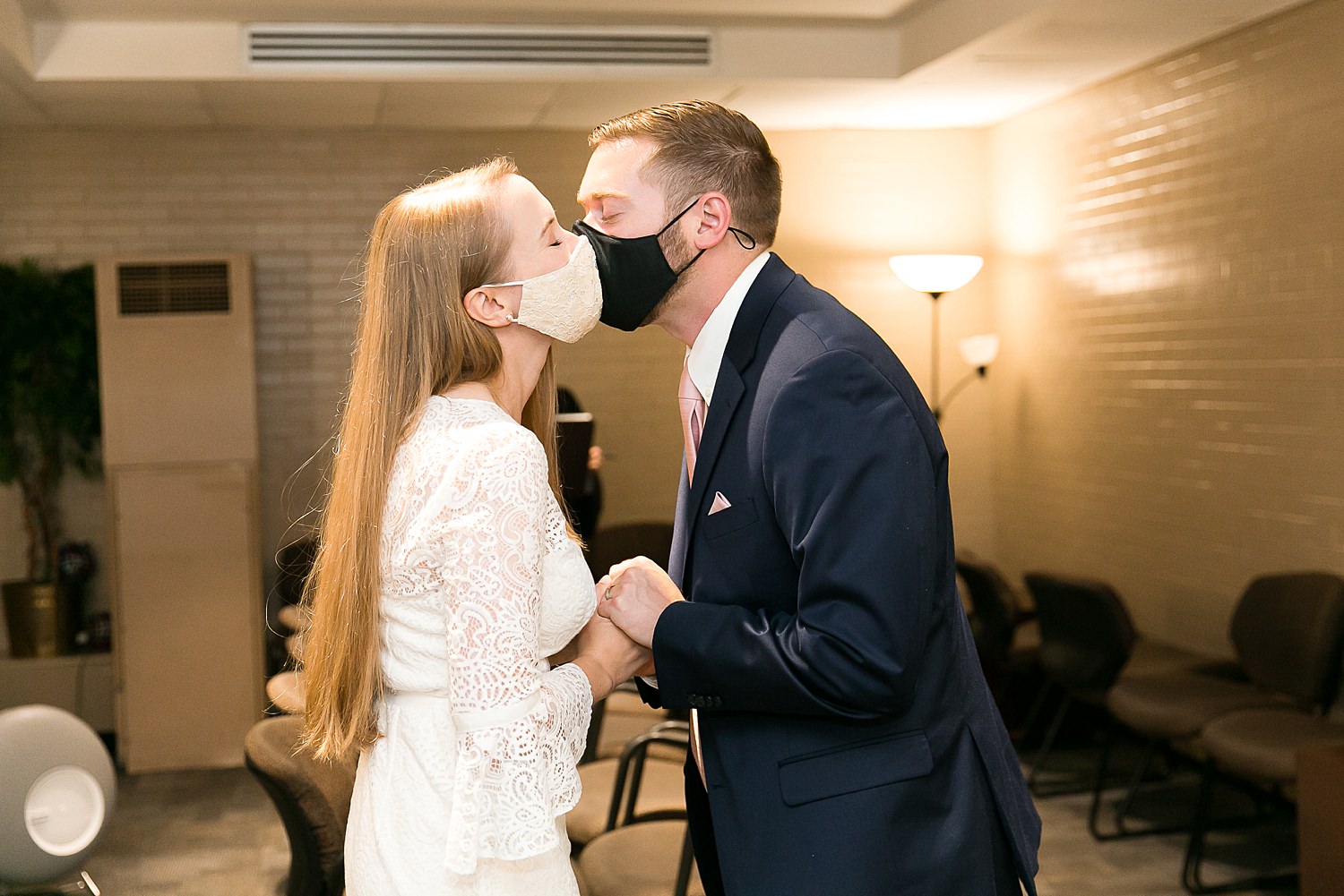 Couple kisses at their Chicago elopement.