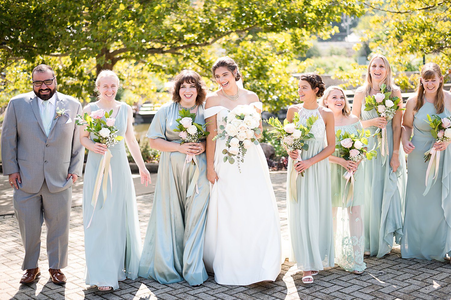 Stephanie walks with bridesmaids.