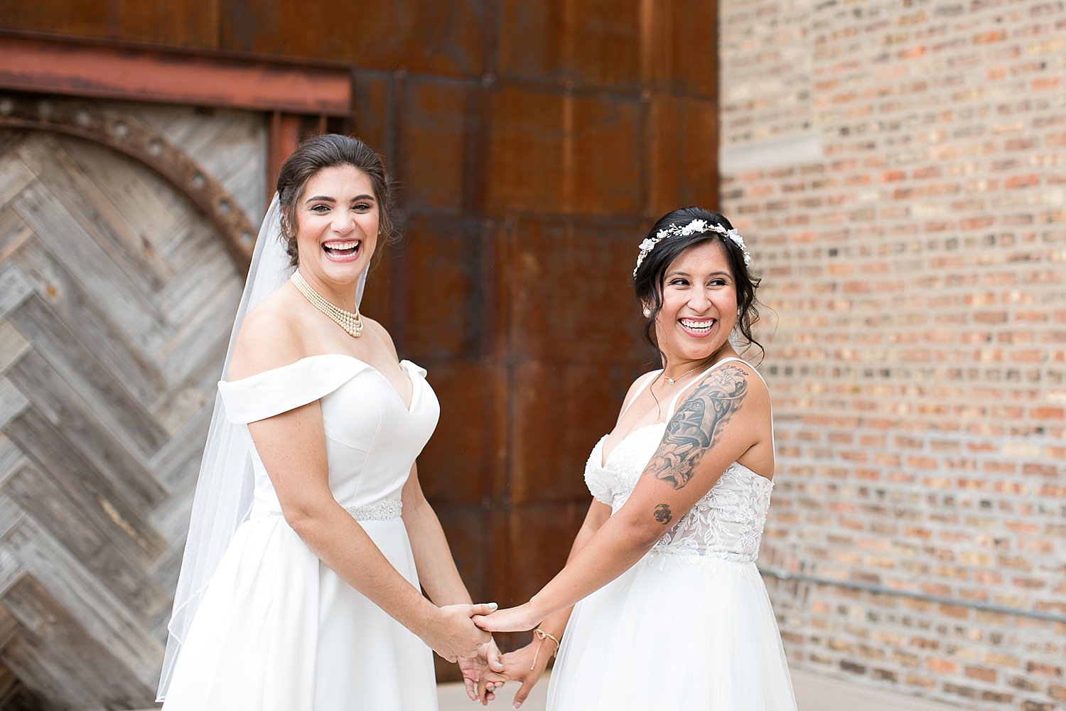 Brides smiling on wedding day at The Haight in Elgin.