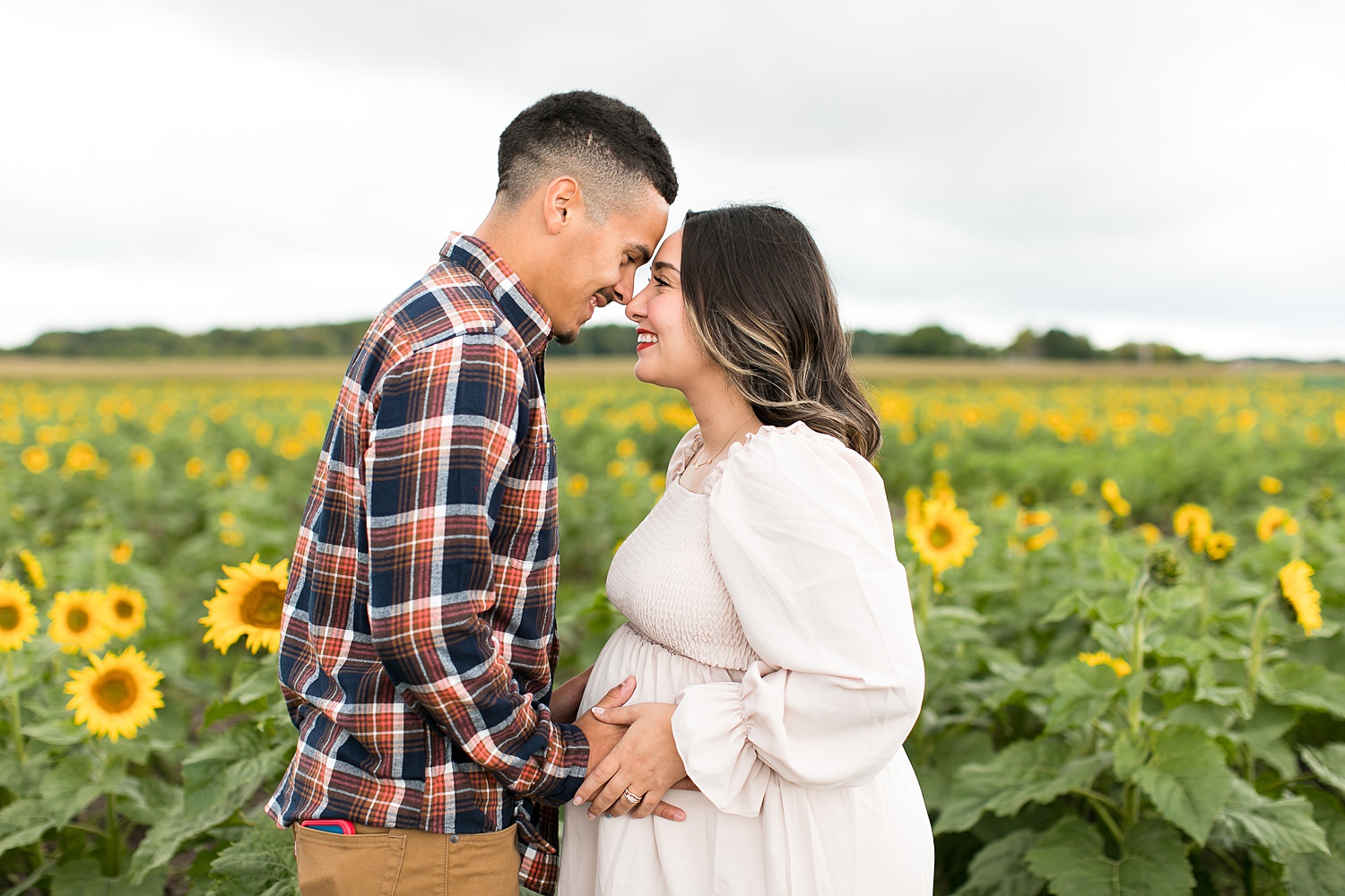 Maternity photography session at sunflower field in Murfreesboro TN