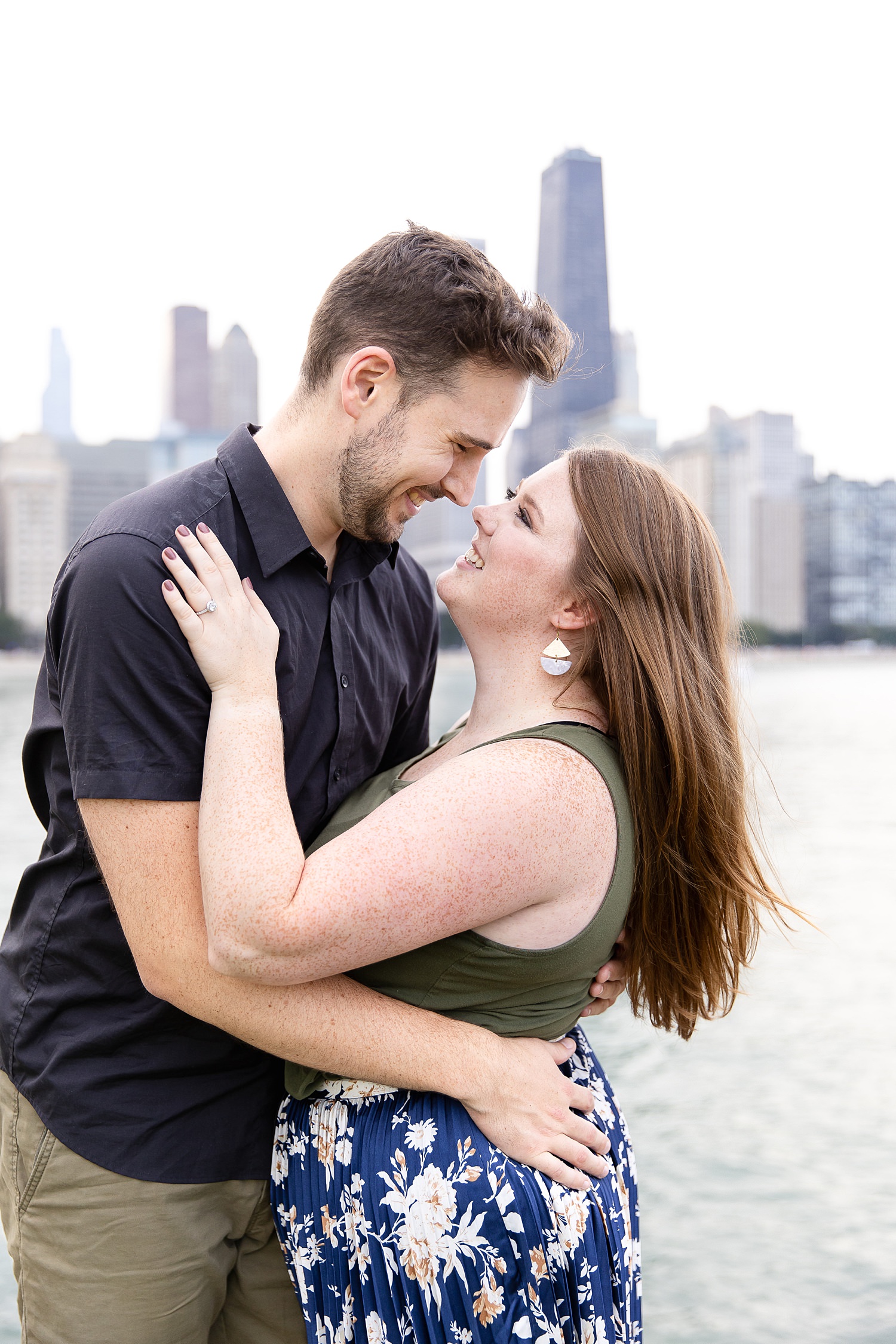 Couple's portrait by Chicago skyline