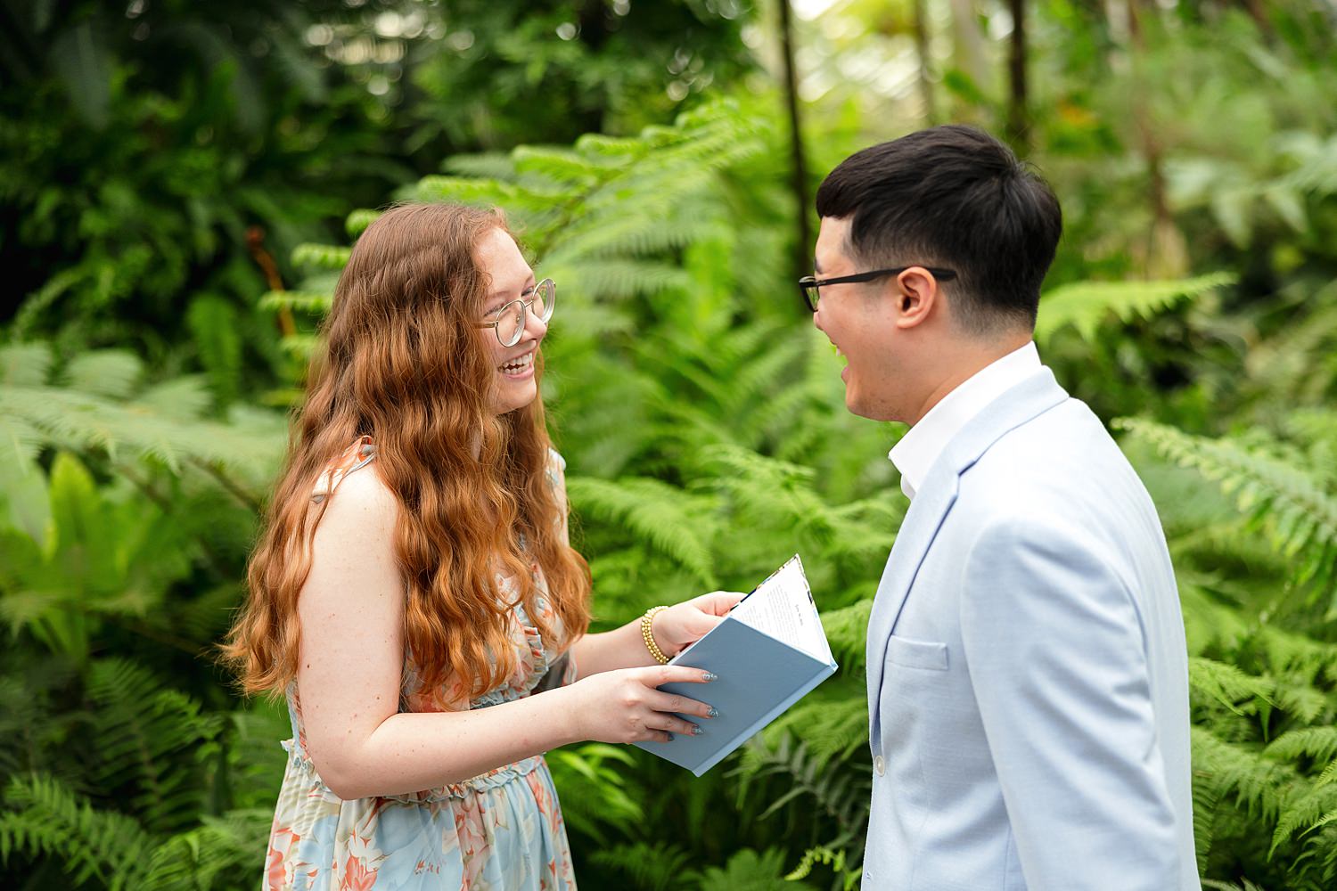 Couple laughs inside Garfield Park Conservatory