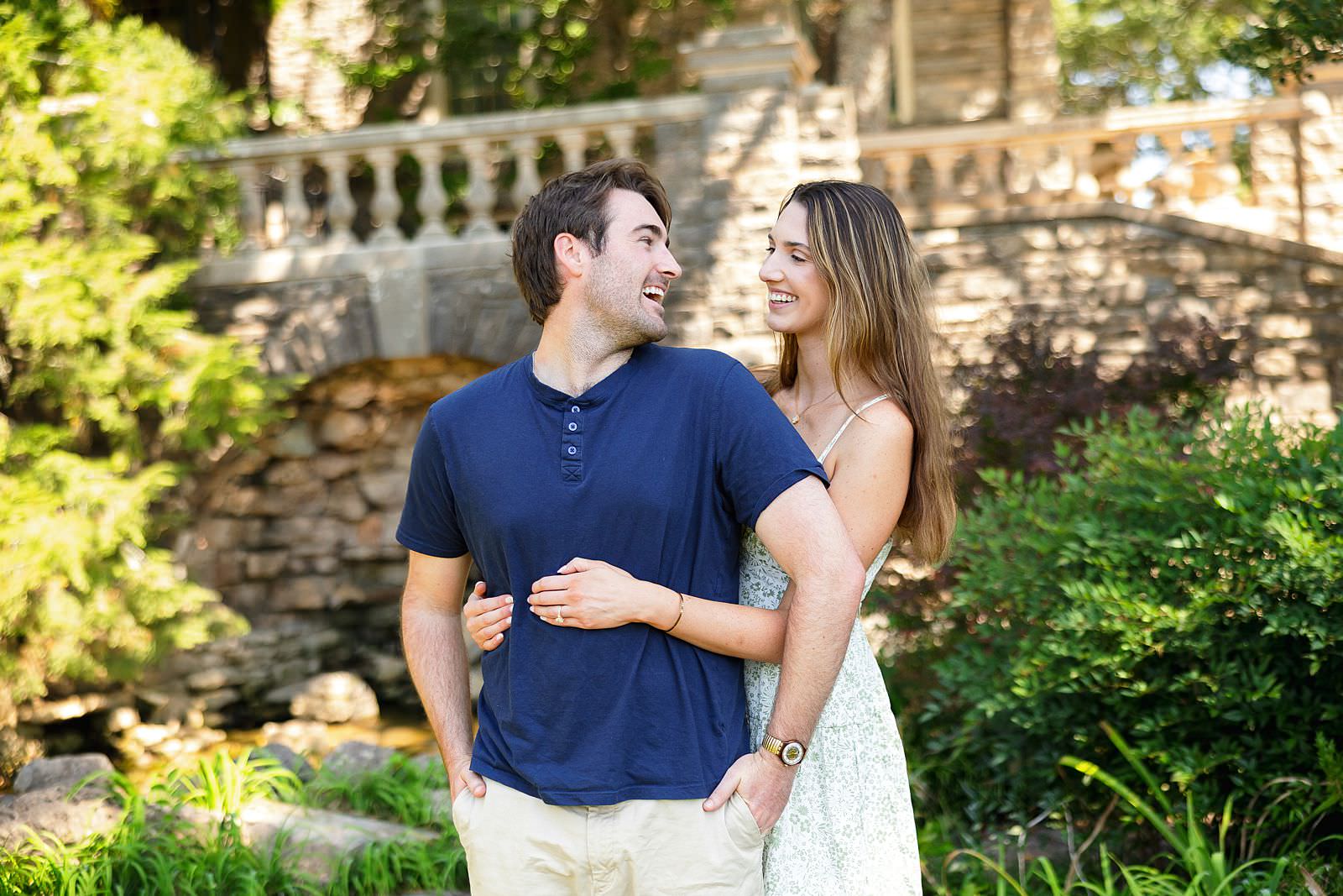 Engaged couple hugs