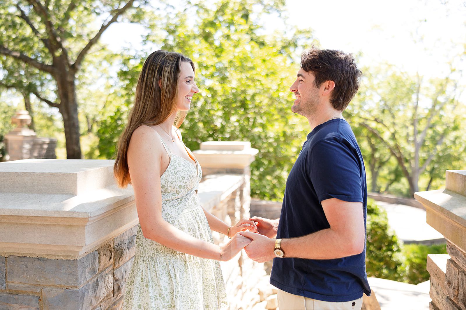 Engaged couple looks at each other