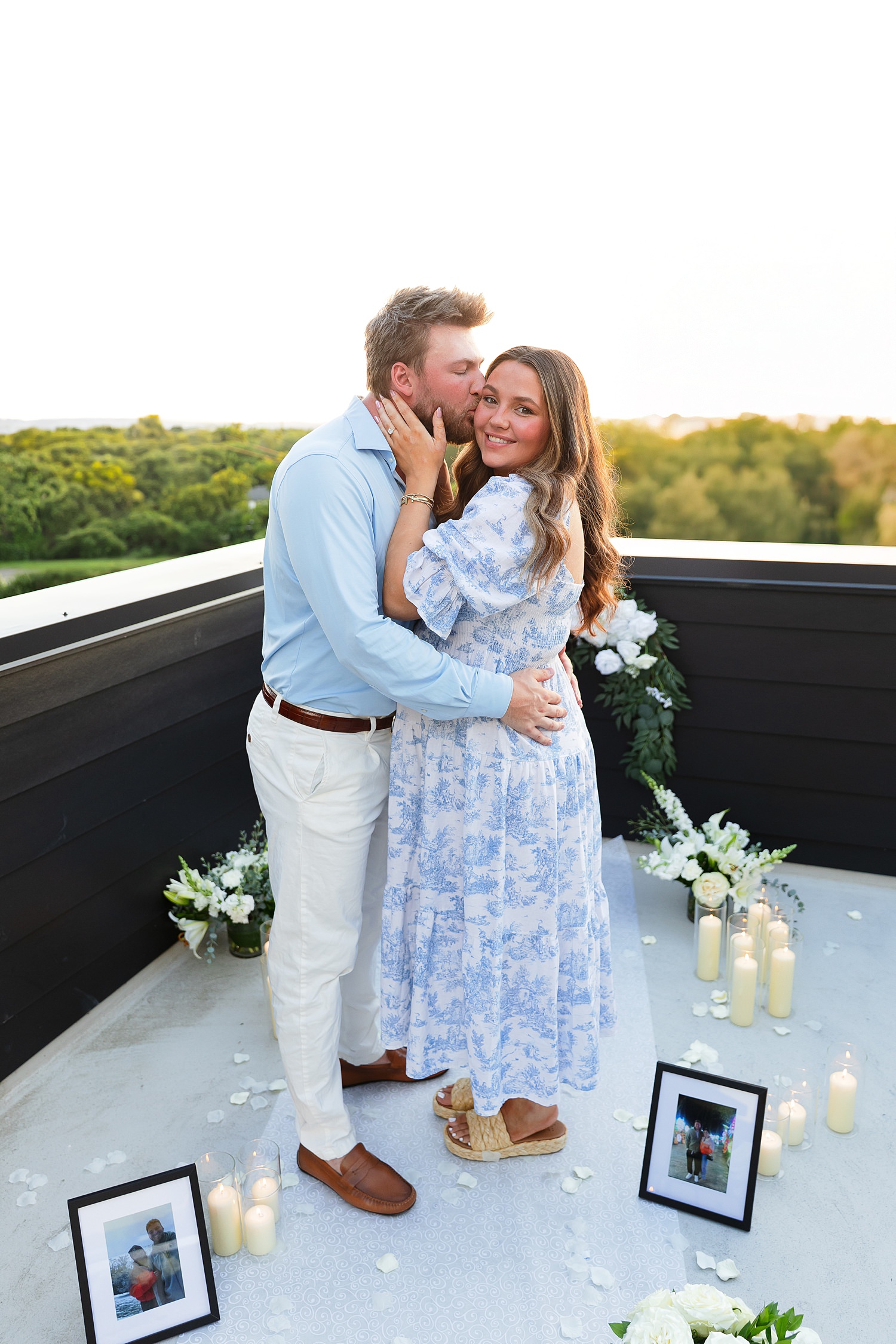 Engaged couple on rooftop in Nashville