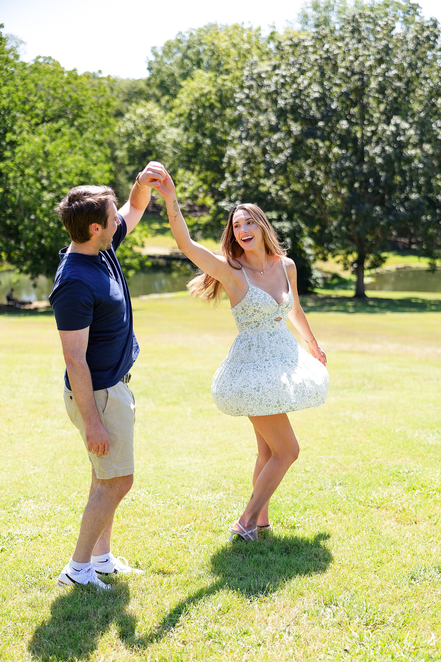 Engaged couple dancing at Cheekwood 