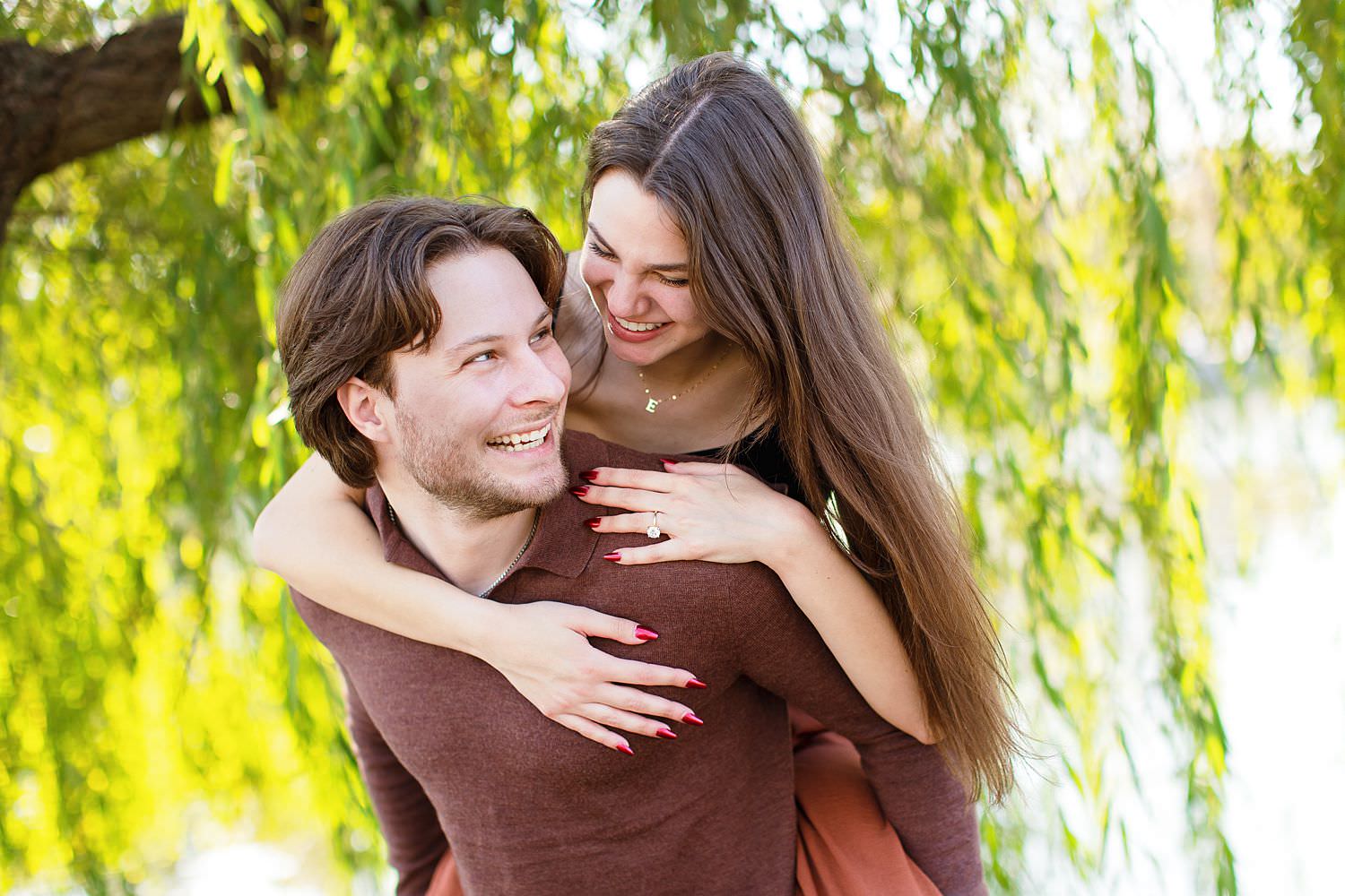 Couple takes engagement photos at Centennial Park